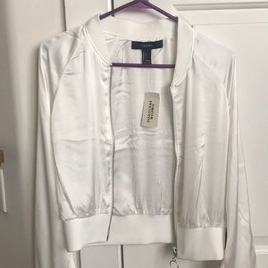 Off white silky jacket with circle zipper